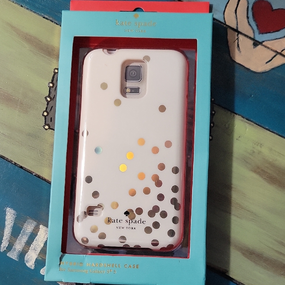 kate spade cream phone case with gold polka dots